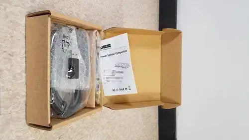 Black power splitter component in clear plastic packaging inside cardboard box for hp usb-c/a universal dock g2 with 65w power delivery and alt mode support