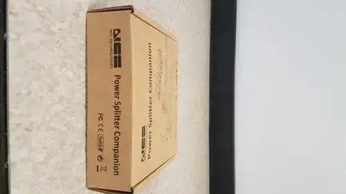 Brown cardboard box labeled power splitter companion for hp usb c a universal dock g2 station with 65w power delivery and alt mode