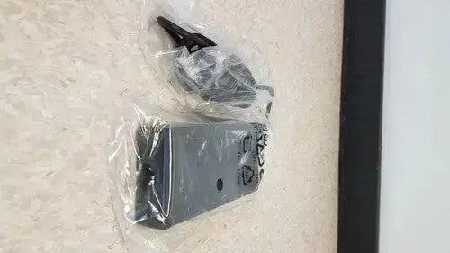 Black plastic doorbell chime with mounting bracket in clear packaging for hp usb-c/a universal dock g2 with 65w power delivery and alt mode