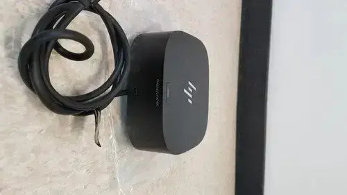 Black rectangular hp usb-c/a universal dock g2 station with coiled cable supports 65w power delivery single cable alt mode