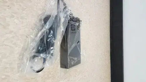 Black rectangular hp usb-c/a universal dock g2 station wrapped in clear plastic with 65w power delivery alt mode