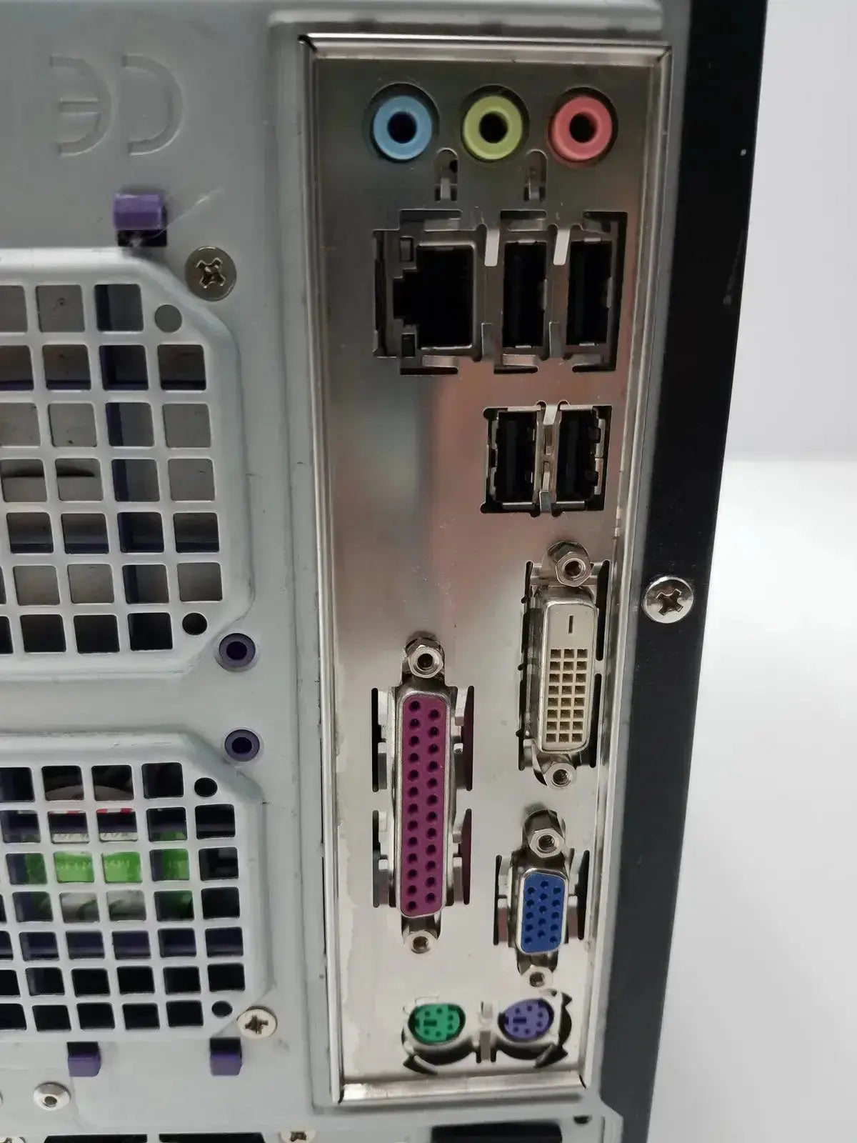 Silver-colored metal back i/o panel with multiple ports including audio jacks on hughes network model mgs3550 hospital surplus