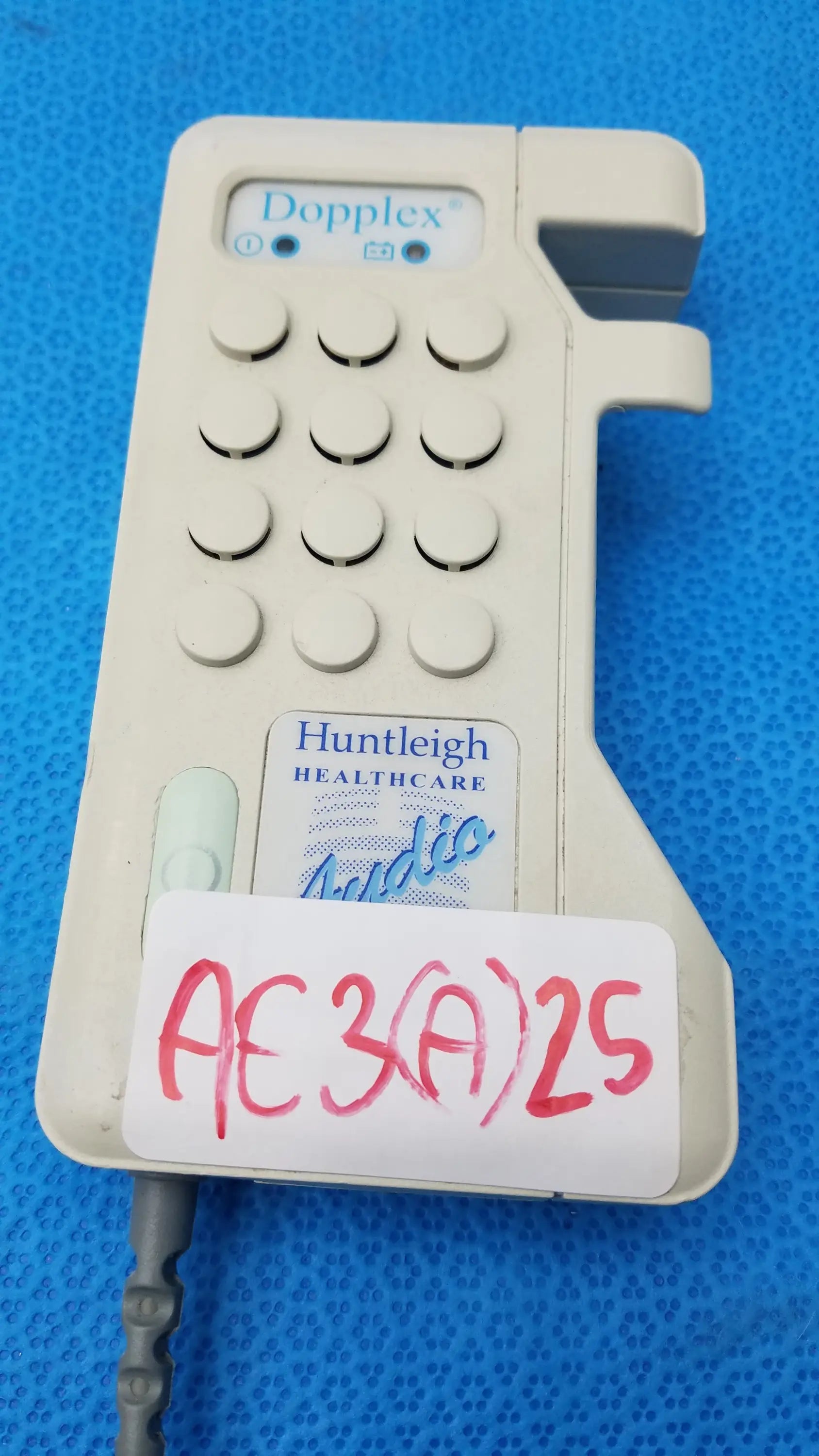 Beige plastic huntleigh dopplex d920 handheld doppler with keypad medical equipment for vascular assessment