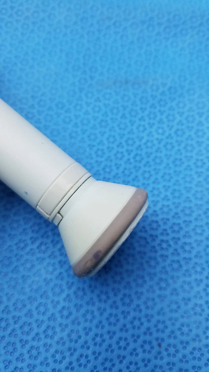 White plastic showerhead with beige rubber seal and segmented design for huntleigh dopplex d920 handheld doppler medical equipment