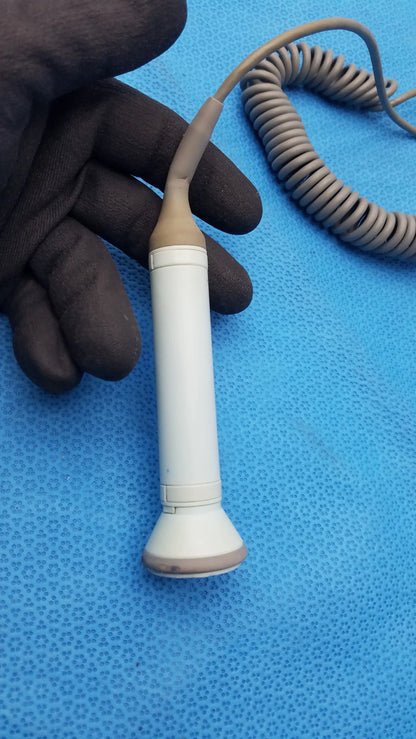 White and beige Huntleigh Dopplex D920 handheld Doppler ultrasound transducer with coiled gray cable medical equipment
