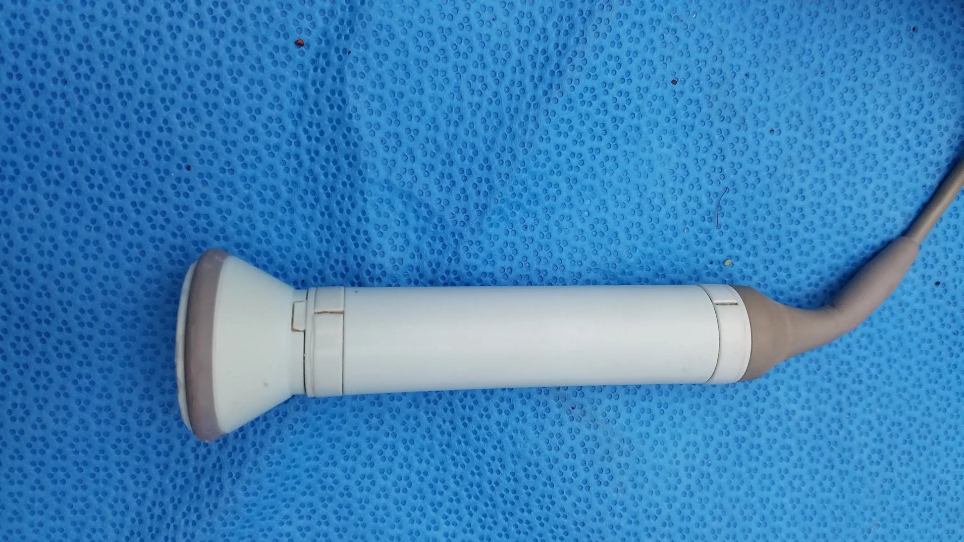 White and beige handheld ultrasound transducer with flexible cable for huntleigh dopplex d920 handheld doppler medical equipment