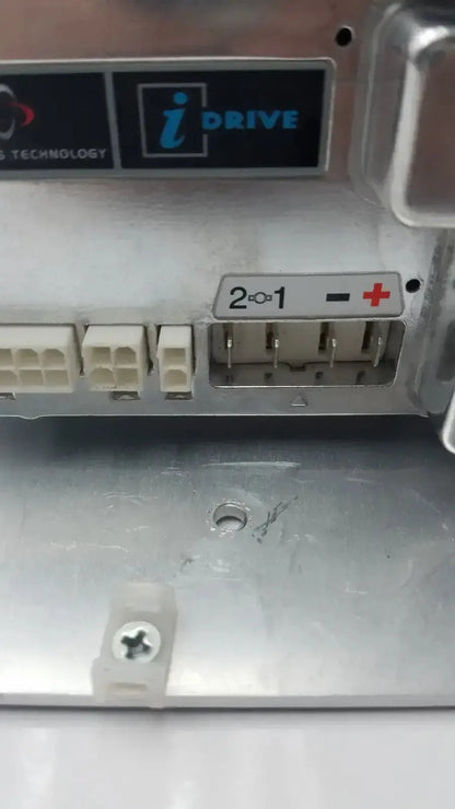 Silver metallic idrive motor controller d51501.01 with white plastic connectors and labeled terminal block by pg drive technology