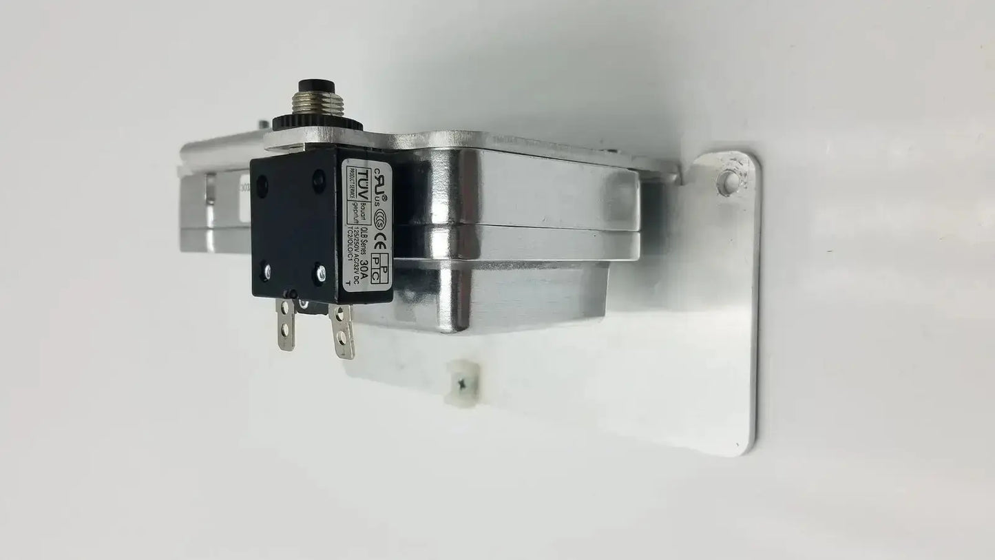 Silver metallic electric solenoid valve with black control unit and mounting plate for iDrive motor controller drive technology