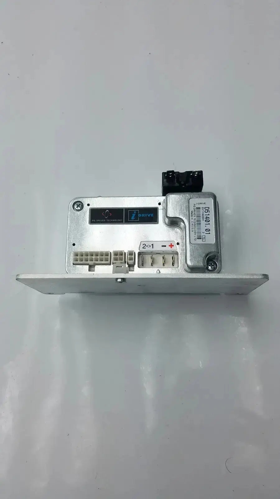 Silver metallic idrive motor controller d51501.01 with black connectors and labeled components for advanced drive technology