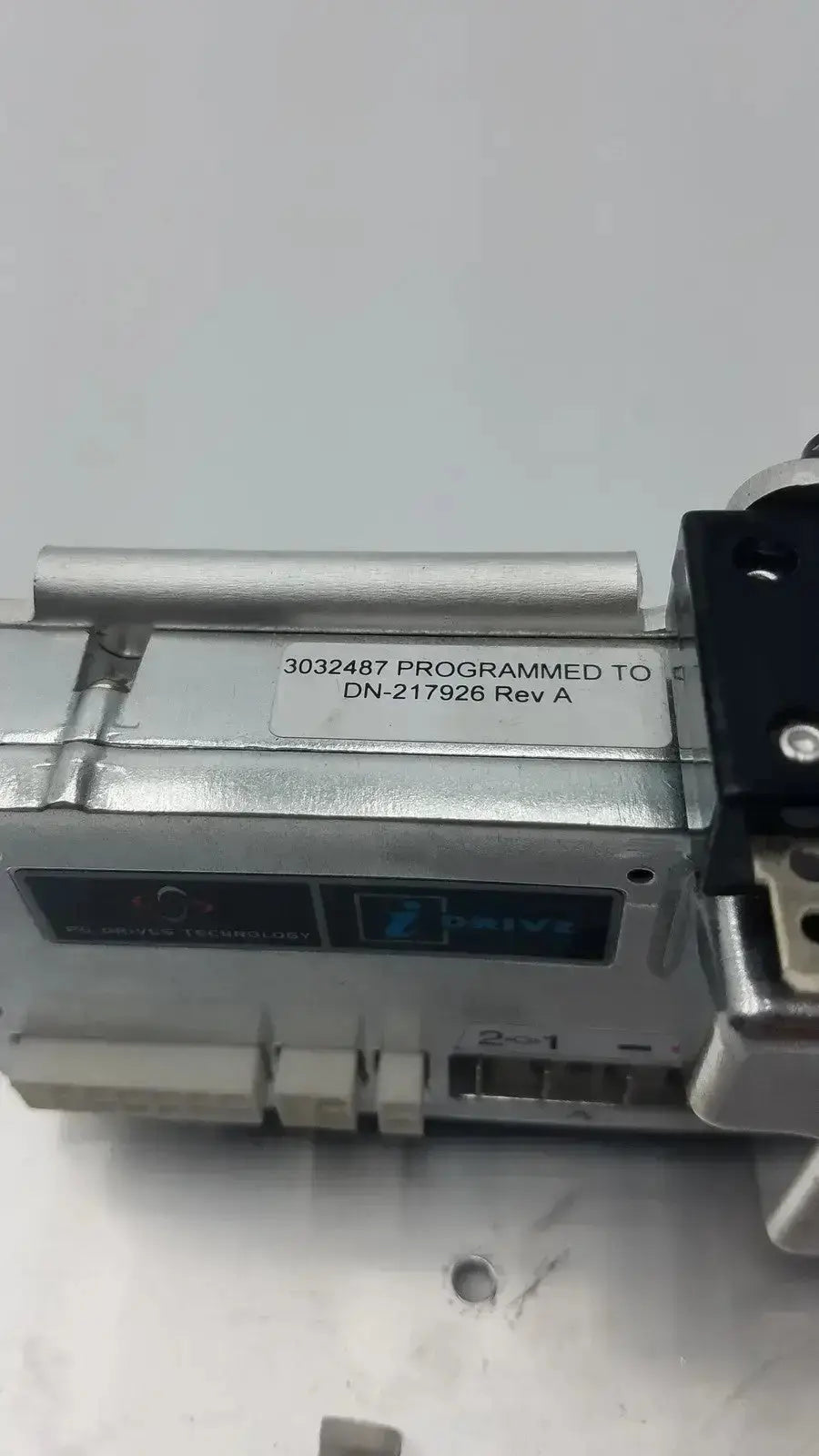 Silver metallic industrial air cylinder with black bracket and label for iDrive motor controller D51501.01 drive technology