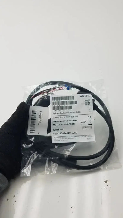 Black coiled signal cable with white label for preassembled motor connection im signal cable 6sl3260-4ma00-1vb0