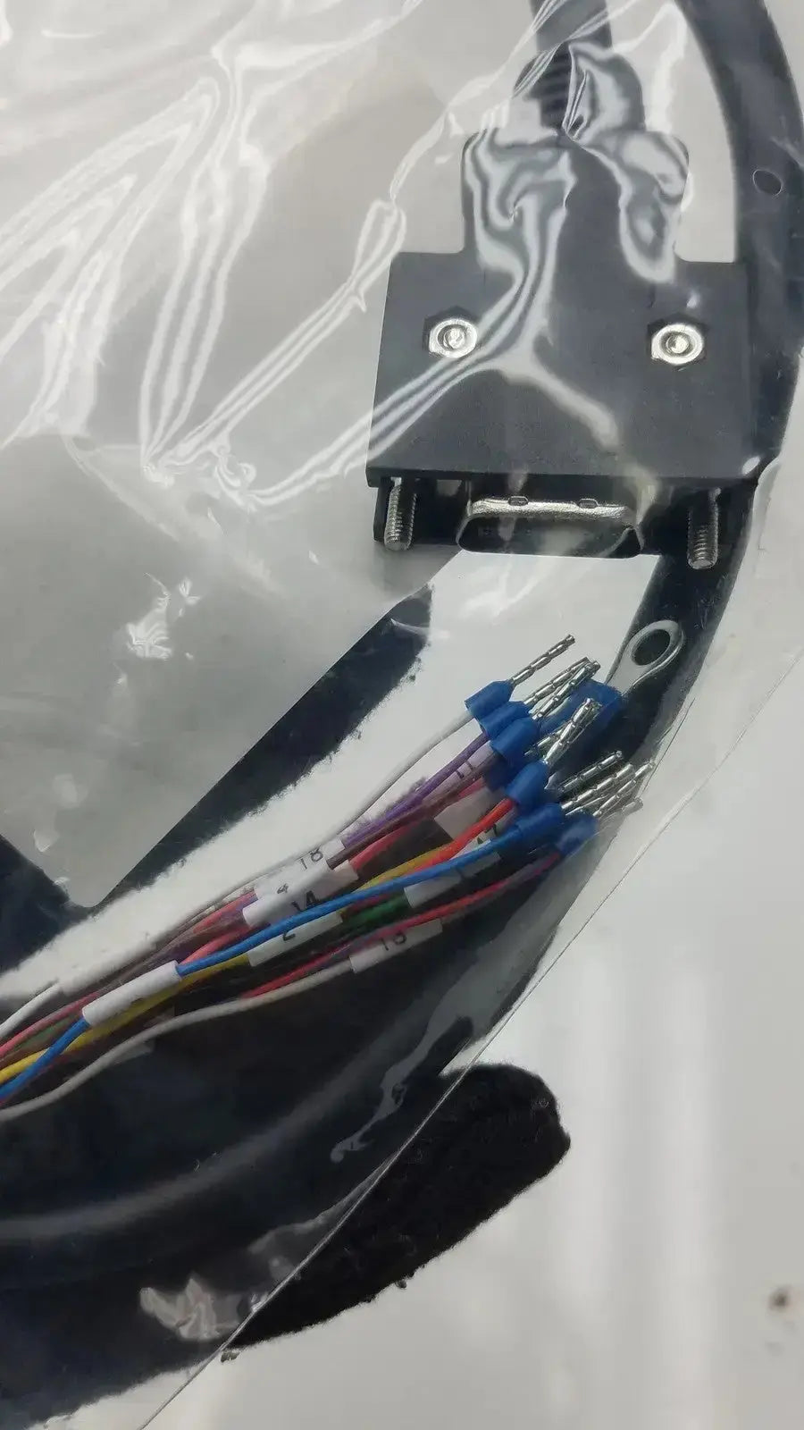 Black rectangular signal cable with multiple colored wires and blue terminals for preassembled motor connection 6SL3260-4MA00-1VB0
