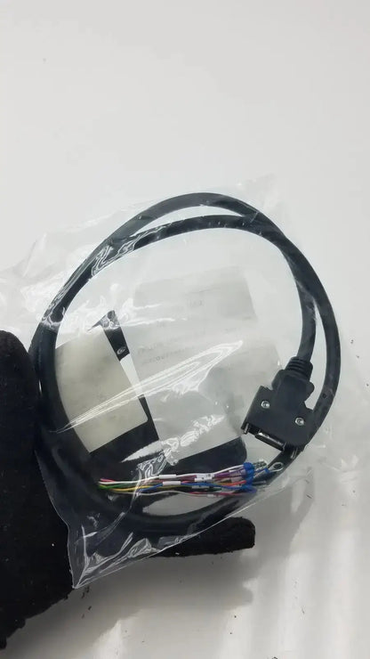 Black coiled signal cable with multi-pin connector and colorful wire ends for preassembled motor connection in clear plastic