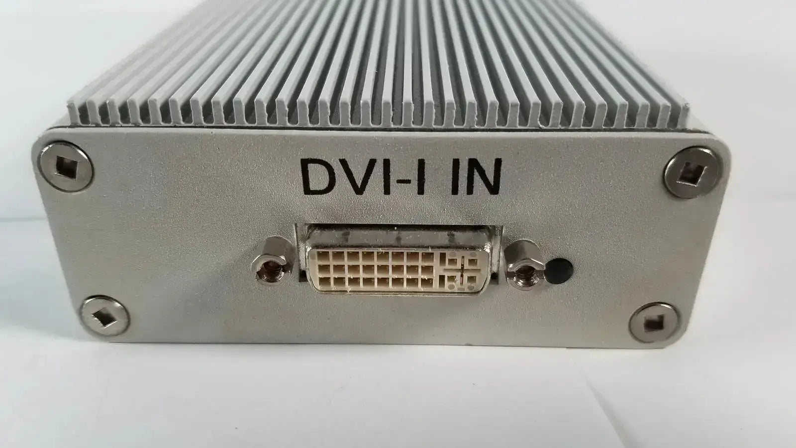 Silver metallic dvi-i port housed in ribbed aluminum casing on back of image stream medical easylink adapter el012277