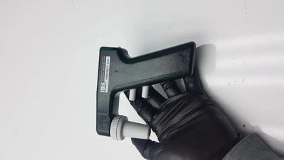 Black plastic hand grip with white threaded cap and ibs branding on integra biosciences acu pipetboy controller