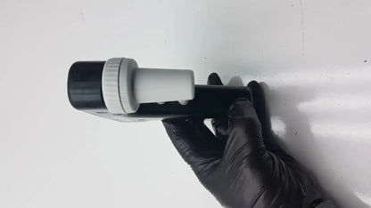 Black and white integra biosciences acu pipetboy controller with textured grip and cylindrical lens assembly on top