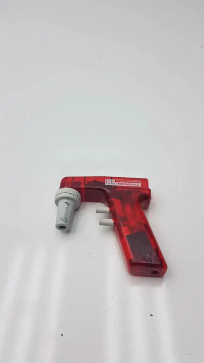 Red plastic handheld spray gun with gray nozzle and trigger for integra biosciences acu pipetboy controller use