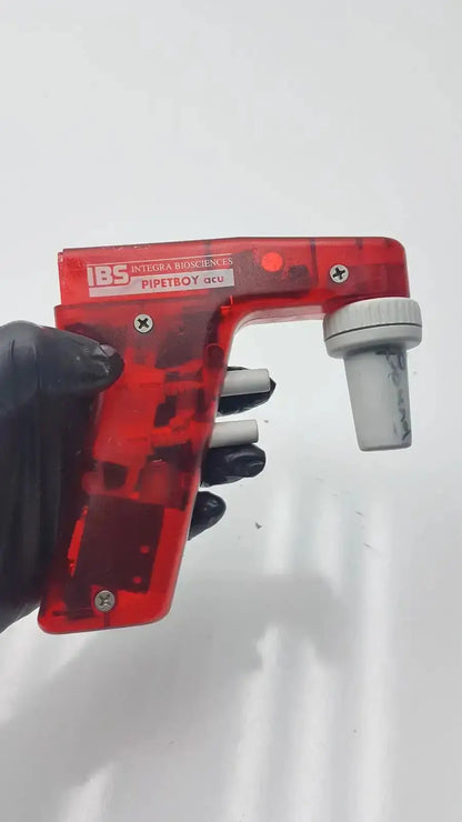 Red translucent plastic integra biosciences acu pipetboy controller with white and gray parts for precise liquid handling
