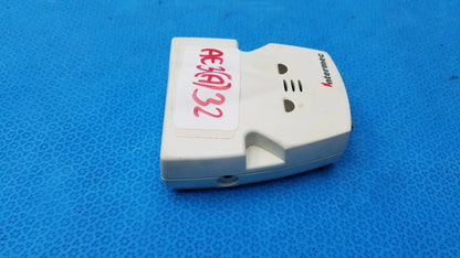White plastic intermec microbar 9730 decoder wedge with red handwritten label and ventilation slots for reuse medical equipment