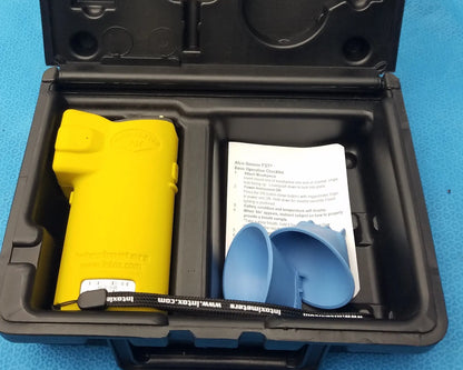 Yellow plastic alco sensor fst portable breathalyzer with blue mouthpiece and black case for medical equipment use