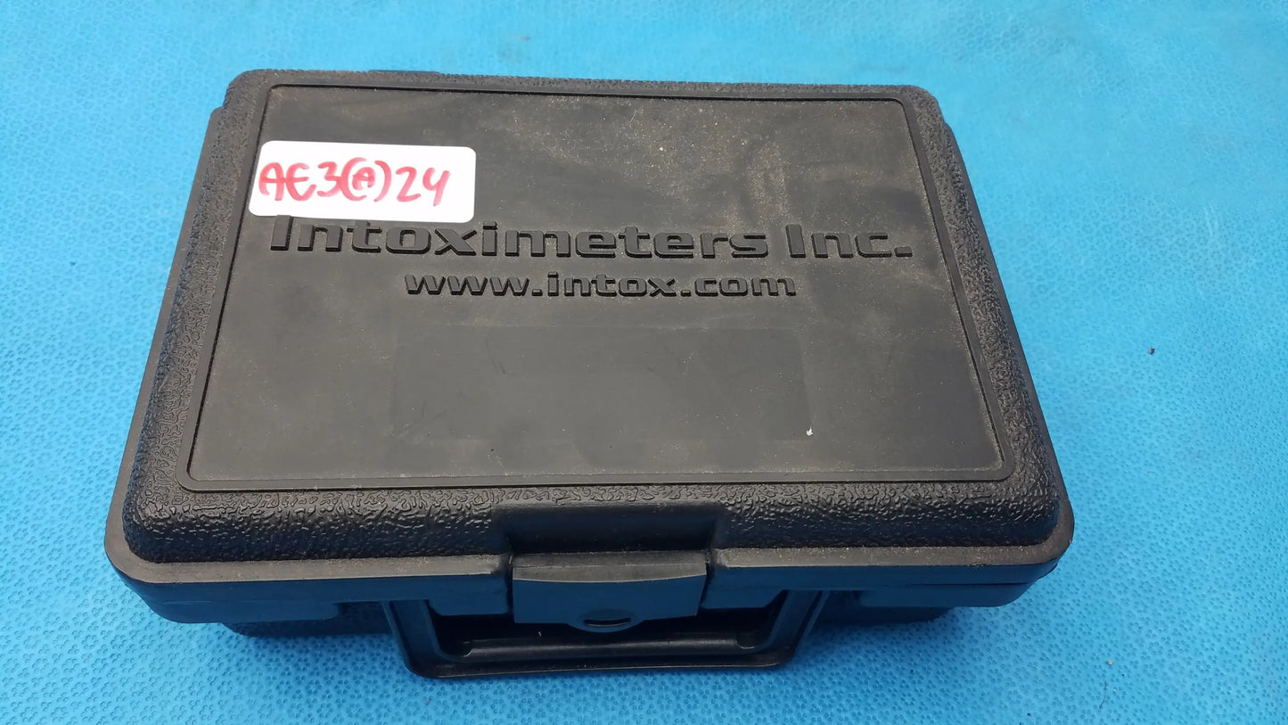 Black plastic case with embossed intoximeters inc branding and handle for intoximeters alco sensor fst portable breathalyzer medical equipment