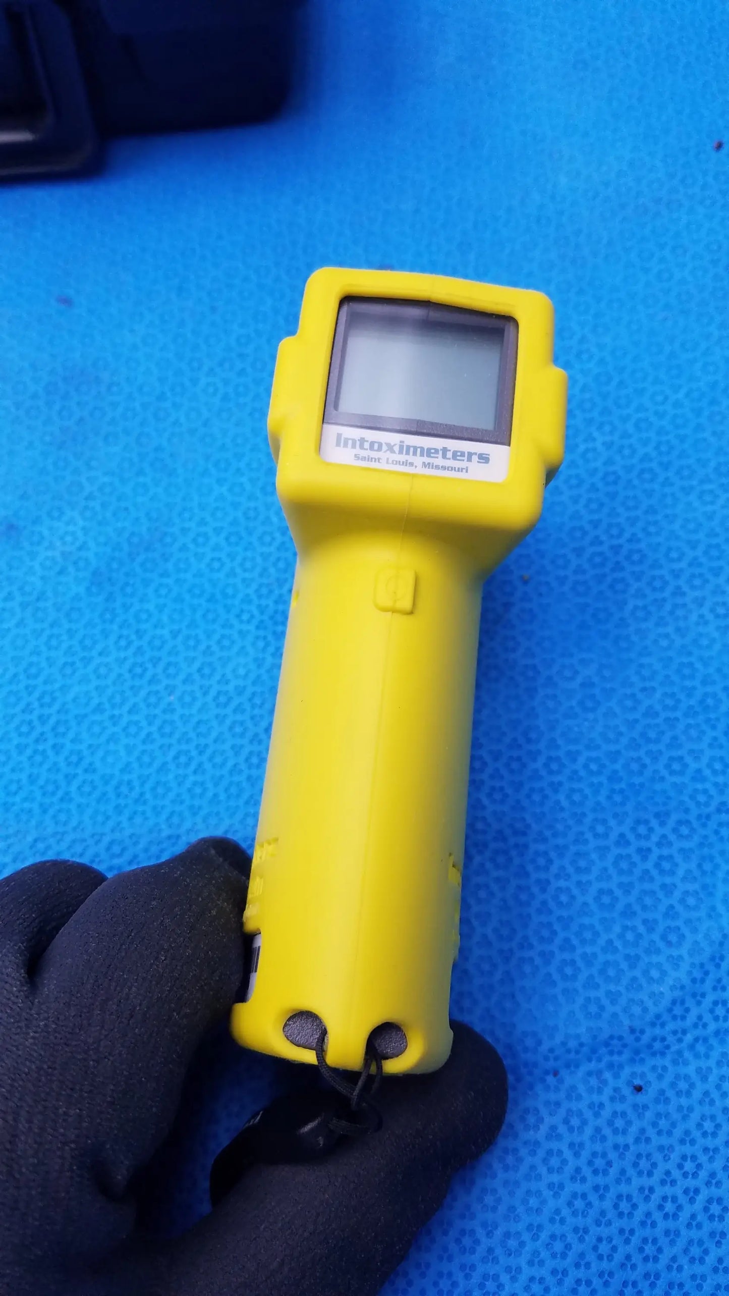 Yellow handheld intoximeters alco-sensor fst portable breathalyzer with digital screen and black grip for medical equipment use