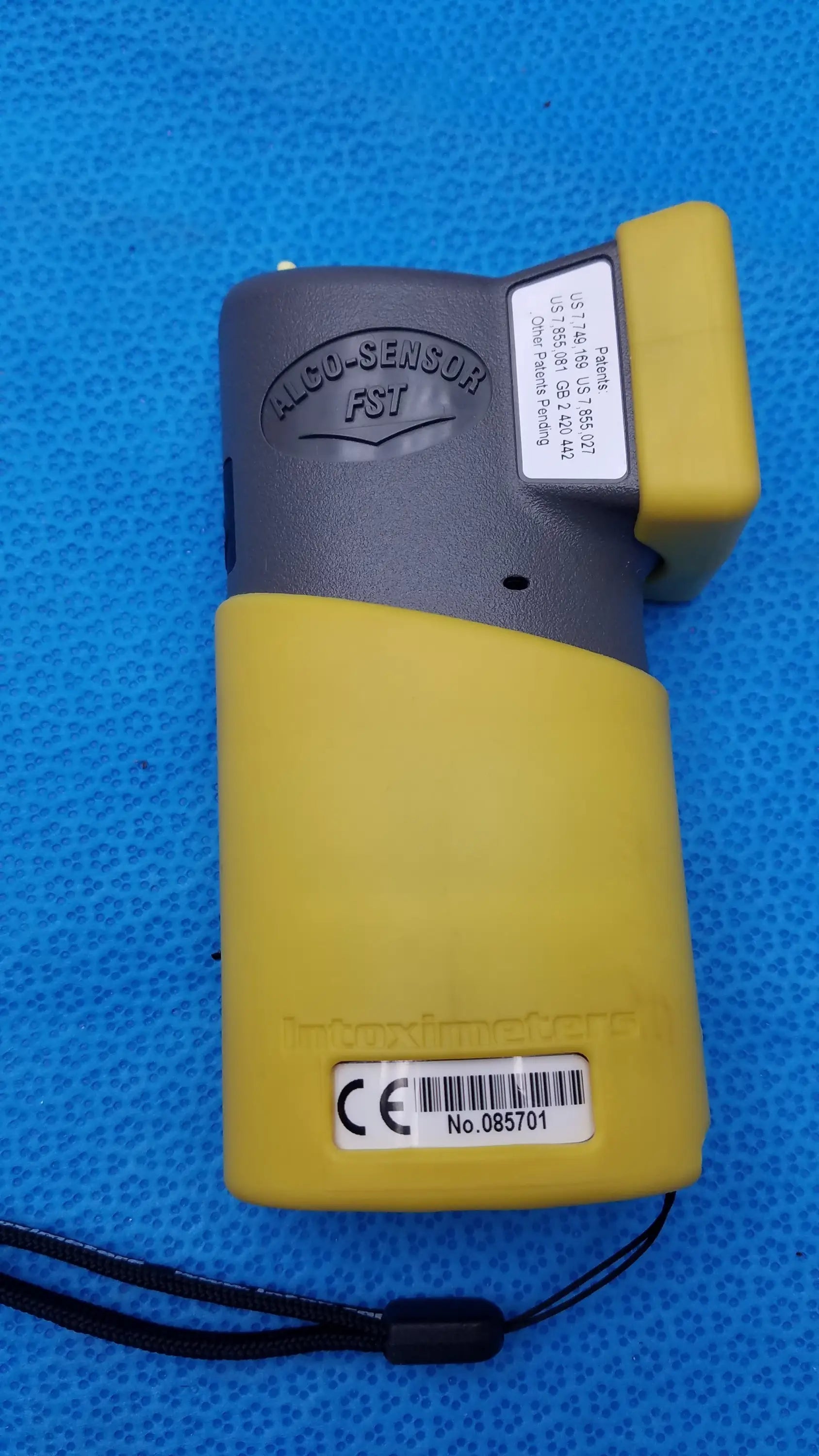 Intoximeters alco-sensor FST portable handheld yellow and gray alcohol sensor with black lanyard medical equipment by smiths medical
