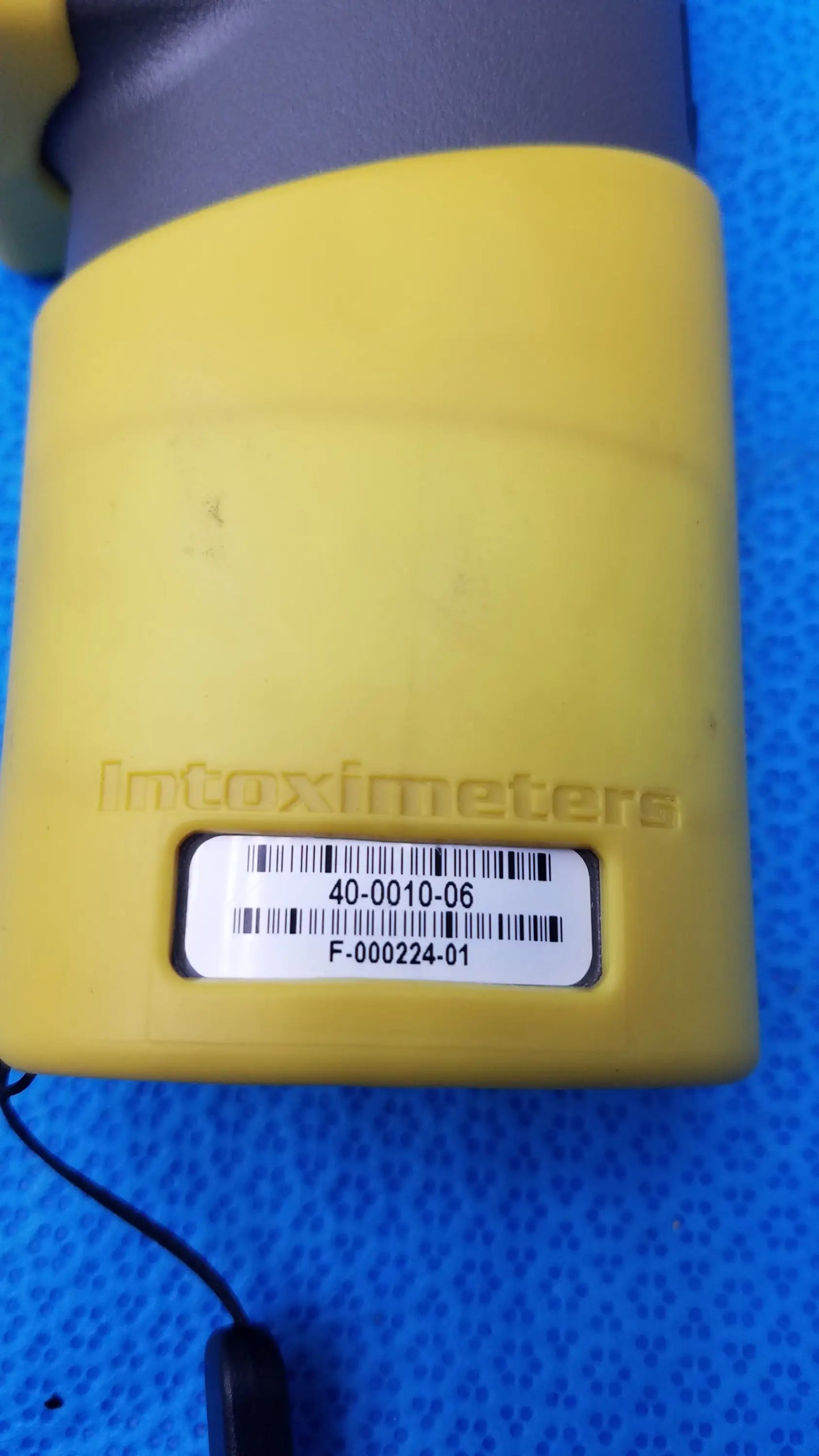 Yellow plastic intoximeter with gray top and barcode label for intoximeters alco sensor fst portable handheld medical equipment
