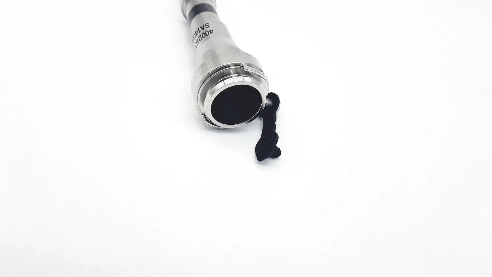 Silver metallic cylindrical connector with black rubber seal and clip for reuse medical equipment Intuitive Surgical cannula