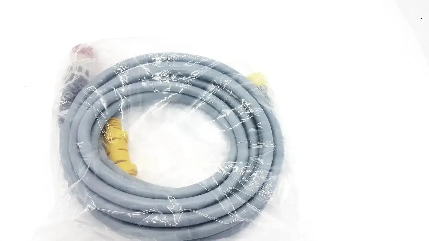 Gray coiled intuitive surgical davinci camera connecting cable with yellow connectors wrapped in clear plastic packaging