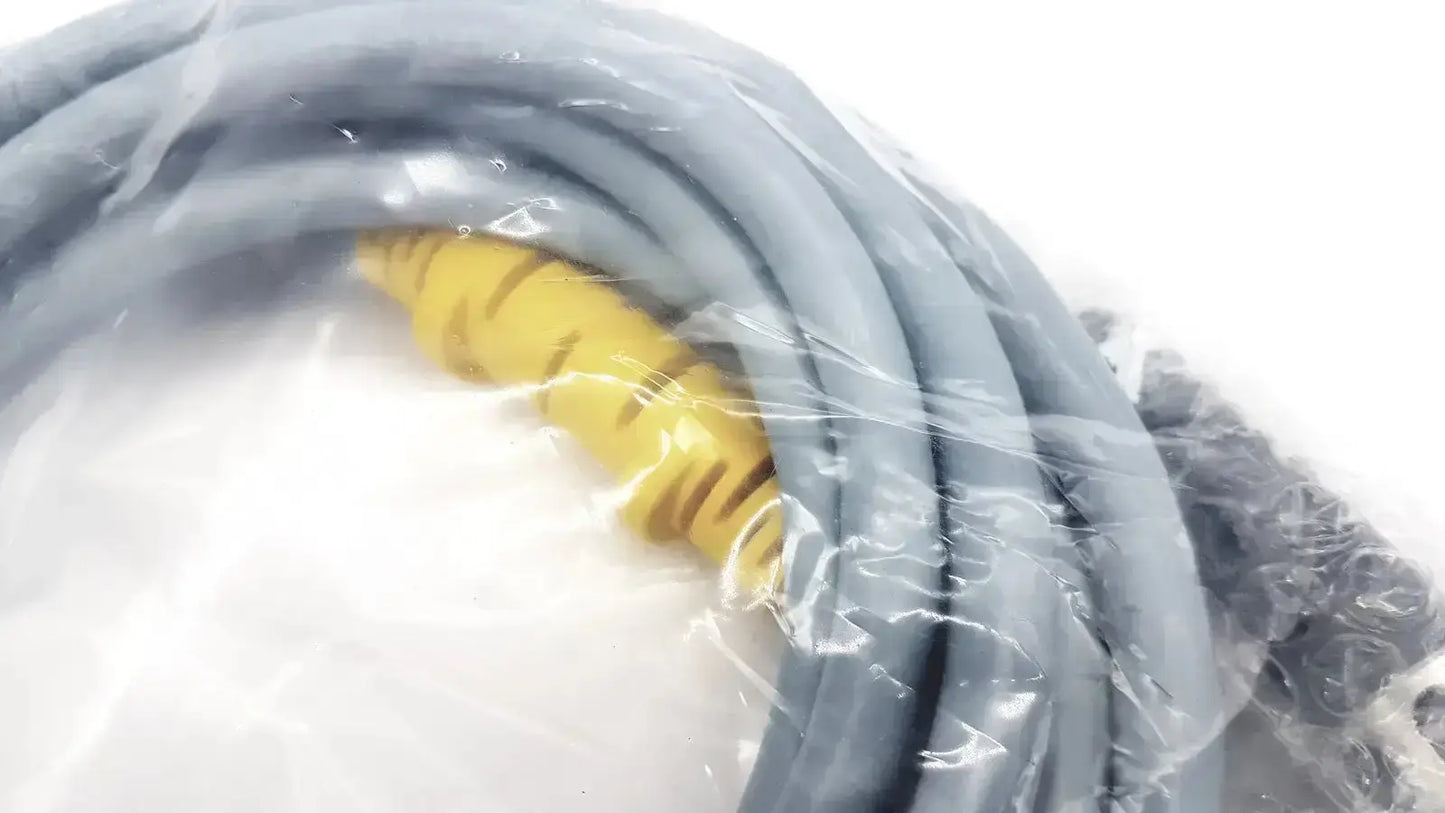 Gray coiled intuitive surgical davinci camera connecting cable with yellow connector wrapped in clear plastic packaging