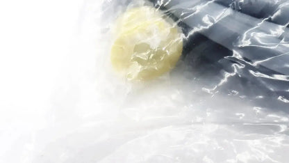 A translucent pale yellow spherical component encased in crinkled plastic wrap for intuitive surgical da vinci camera connecting cable
