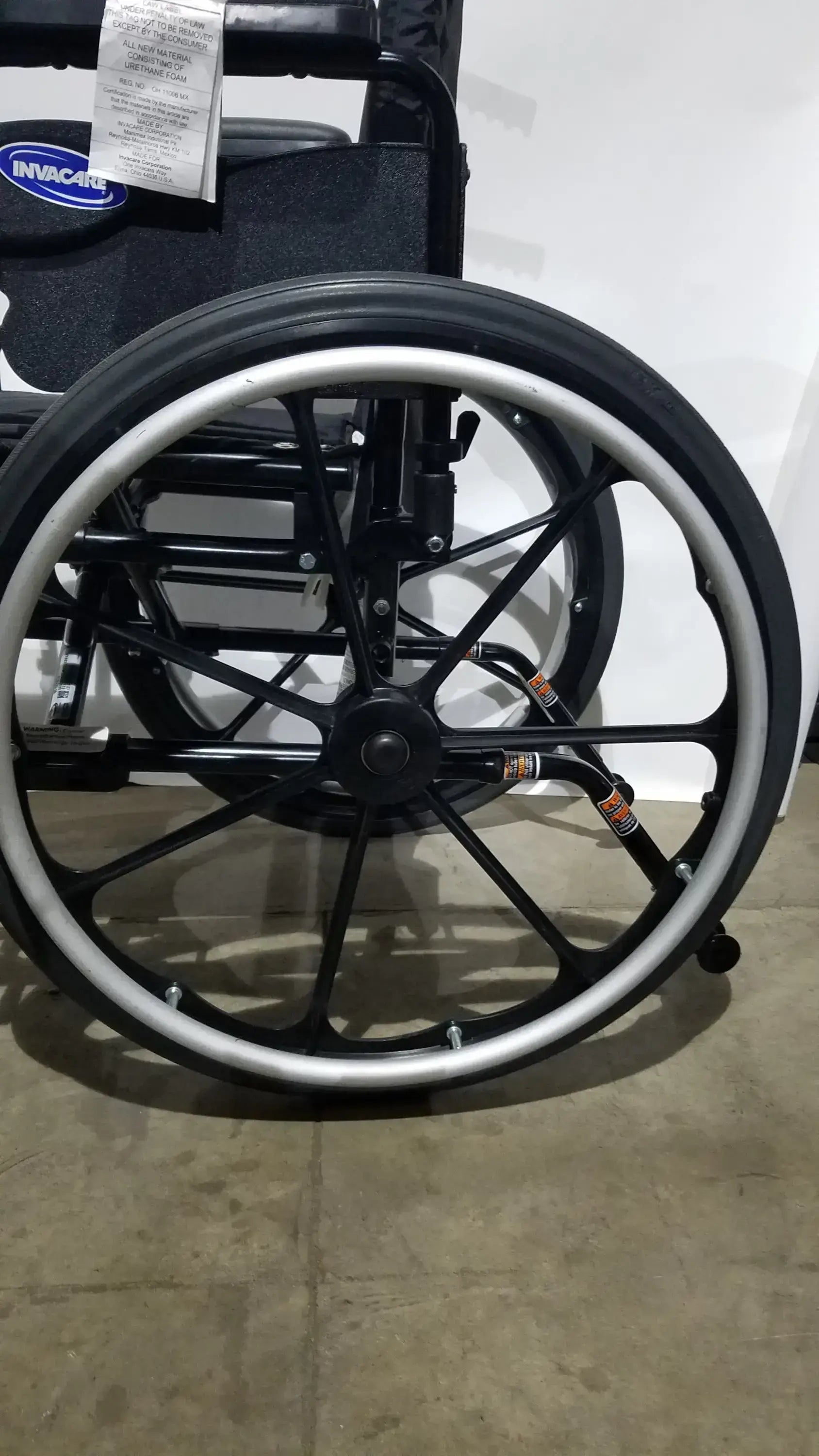 Invacare Tracer SX5 Folding Wheelchair – Black Finish with Padded Arm Supports