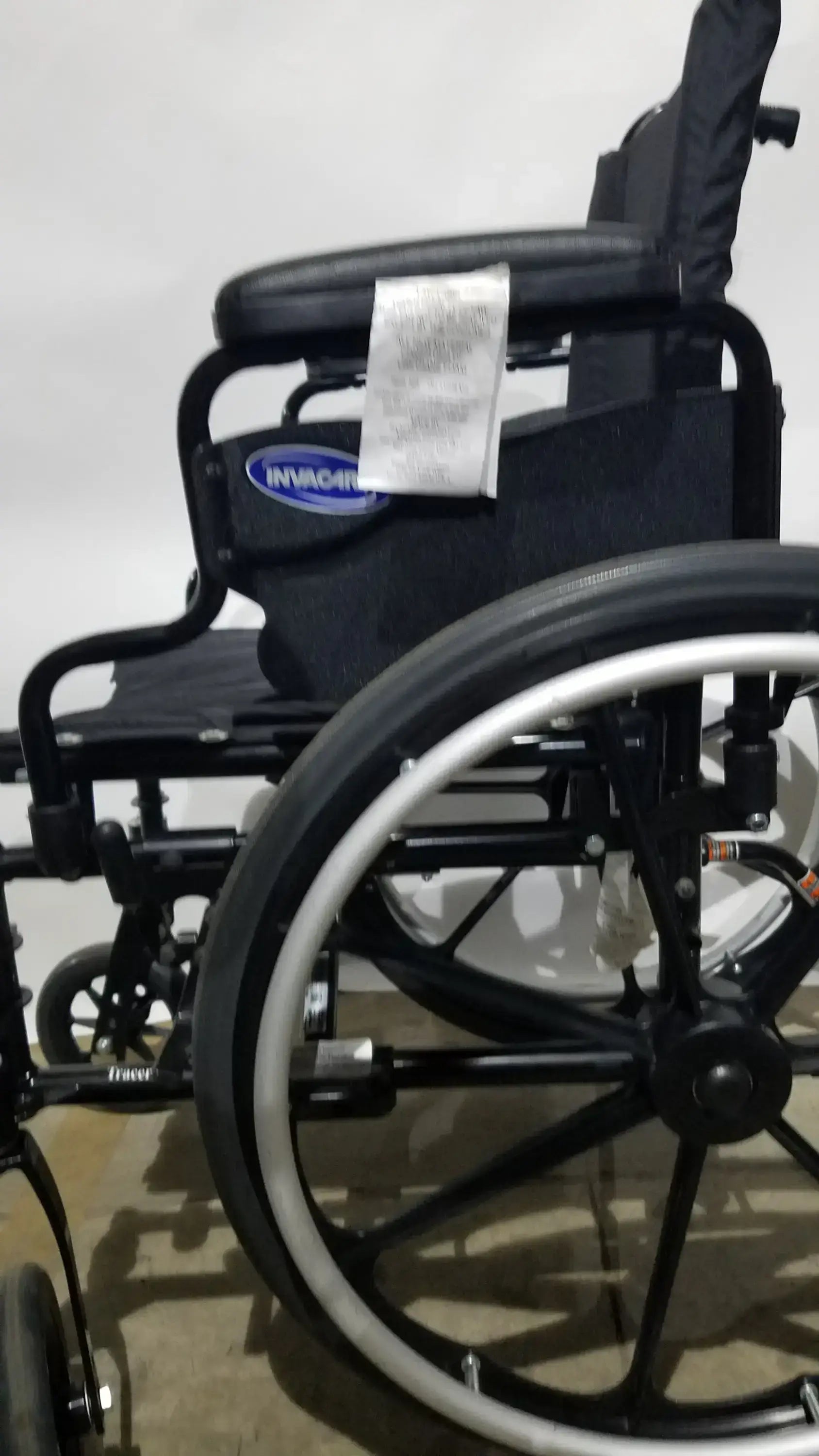Invacare Tracer SX5 Folding Wheelchair – Black Finish with Padded Arm Supports
