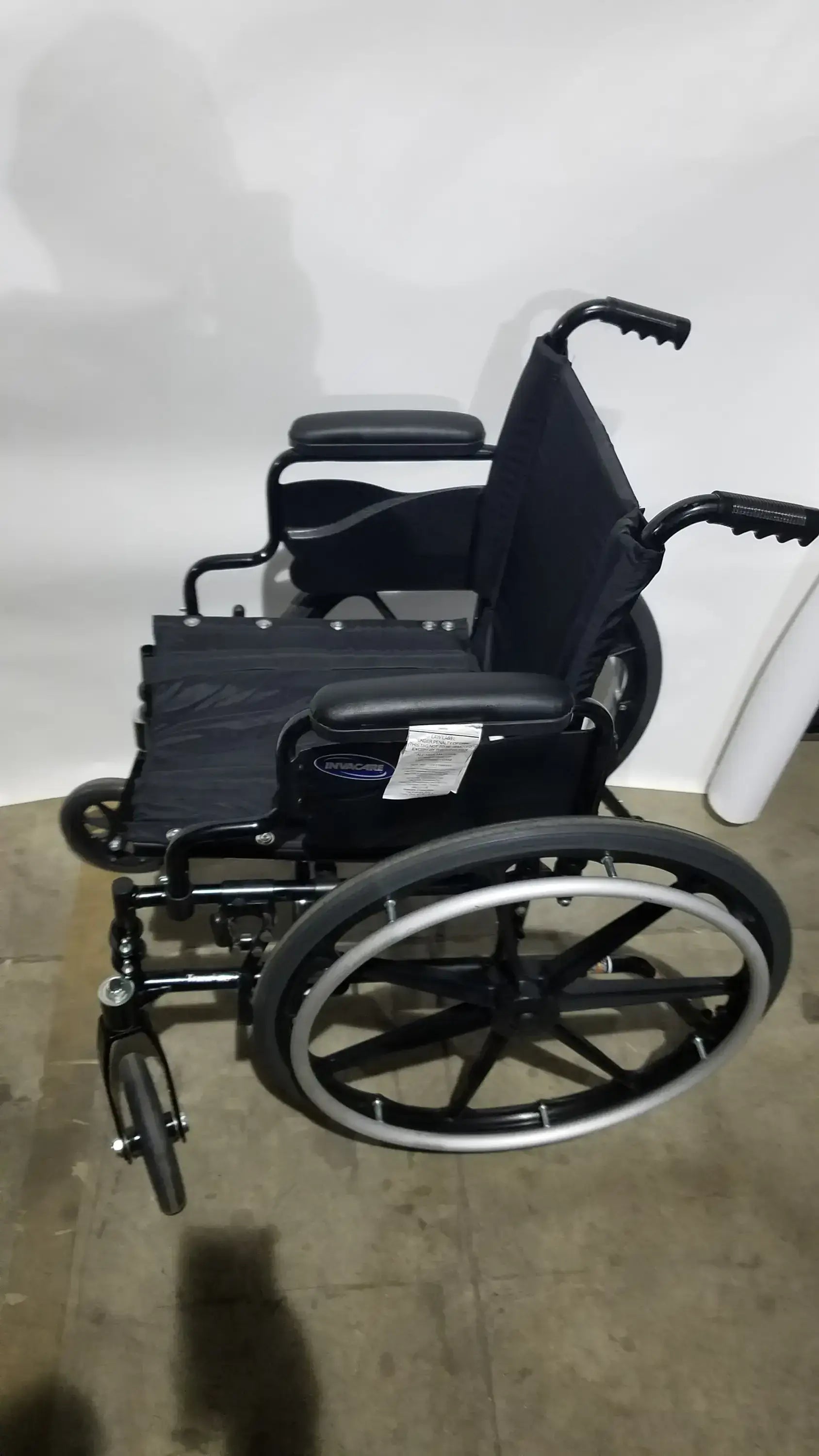 Invacare Tracer SX5 Folding Wheelchair – Black Finish with Padded Arm Supports