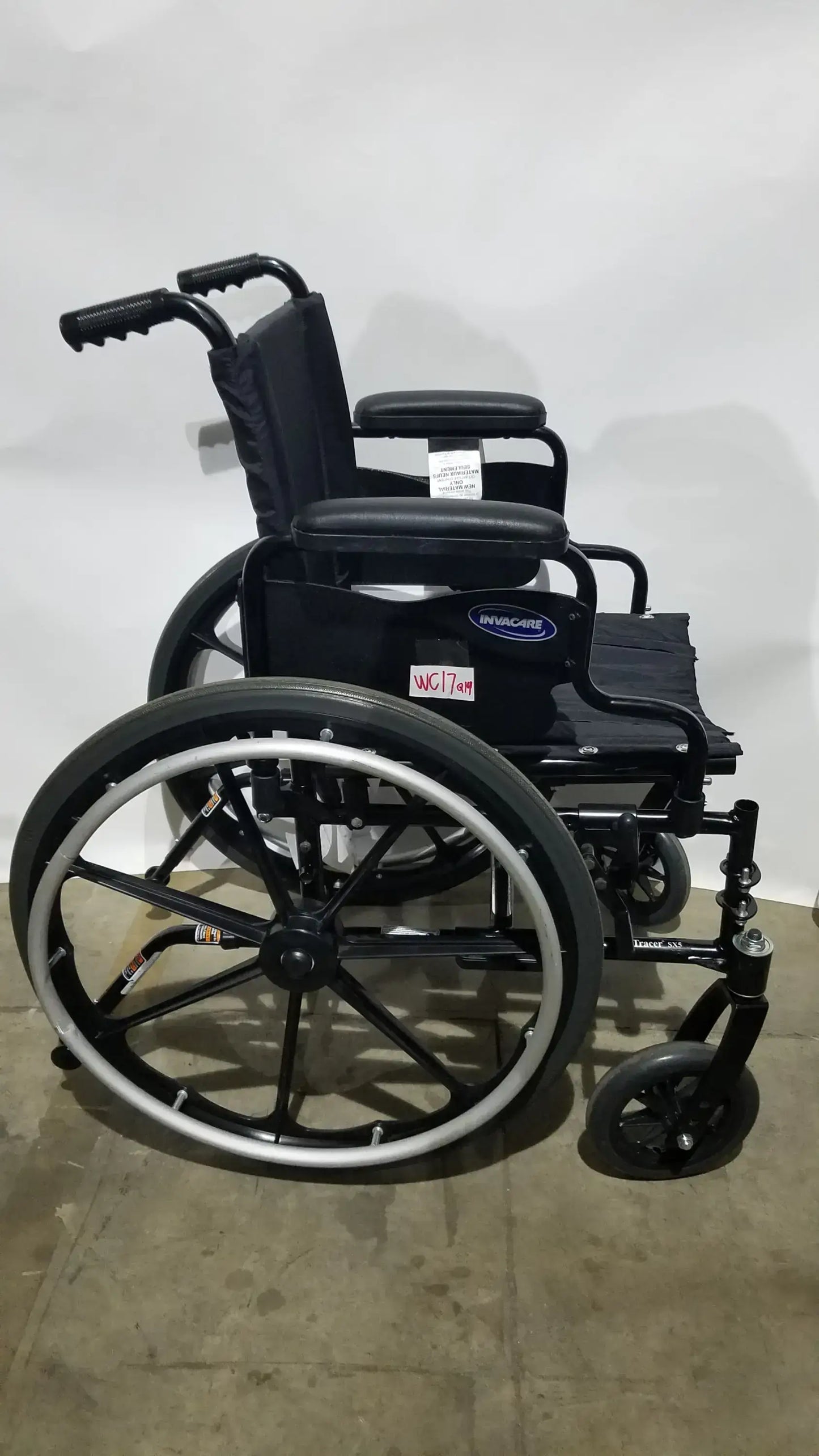 Invacare Tracer SX5 Folding Wheelchair – Black Finish with Padded Arm Supports