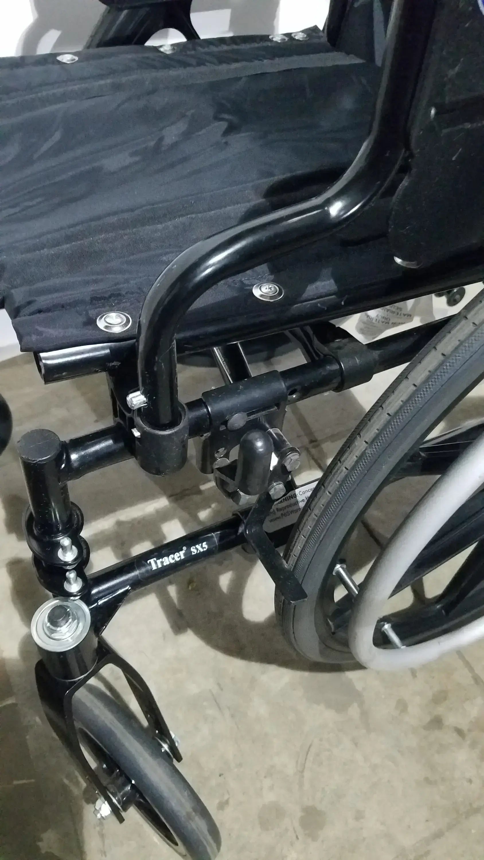 Invacare Tracer SX5 Folding Wheelchair – Black Finish with Padded Arm Supports