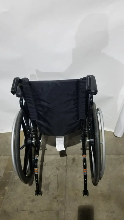 Invacare Tracer SX5 Folding Wheelchair – Black Finish with Padded Arm Supports
