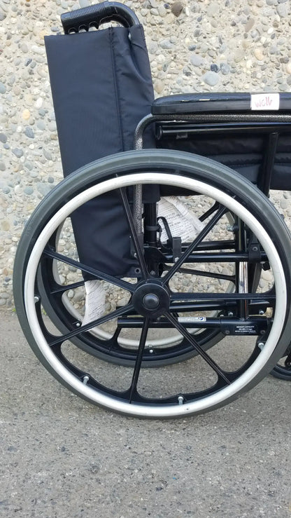 Invacare Tracer SX5 Heavy-Duty Black Wheelchair with Fixed Arm Rests