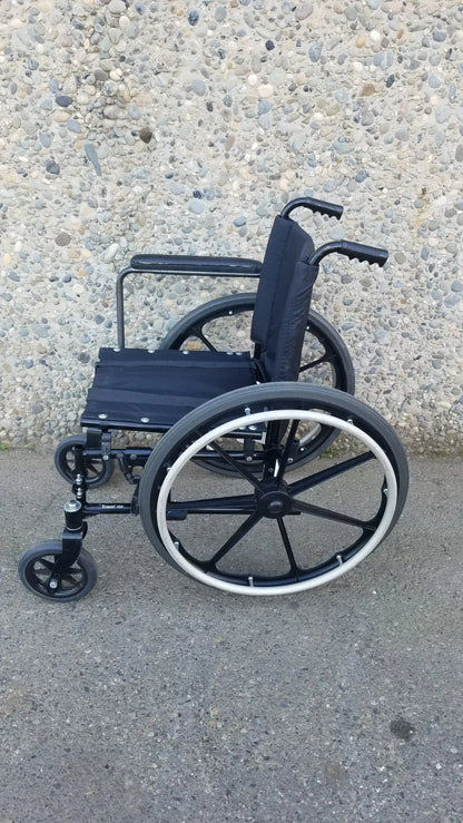 Invacare Tracer SX5 Heavy-Duty Black Wheelchair with Fixed Arm Rests