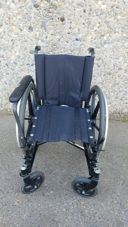 Invacare Tracer SX5 Heavy-Duty Black Wheelchair with Fixed Arm Rests