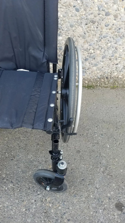 Invacare Tracer SX5 Heavy-Duty Black Wheelchair with Fixed Arm Rests