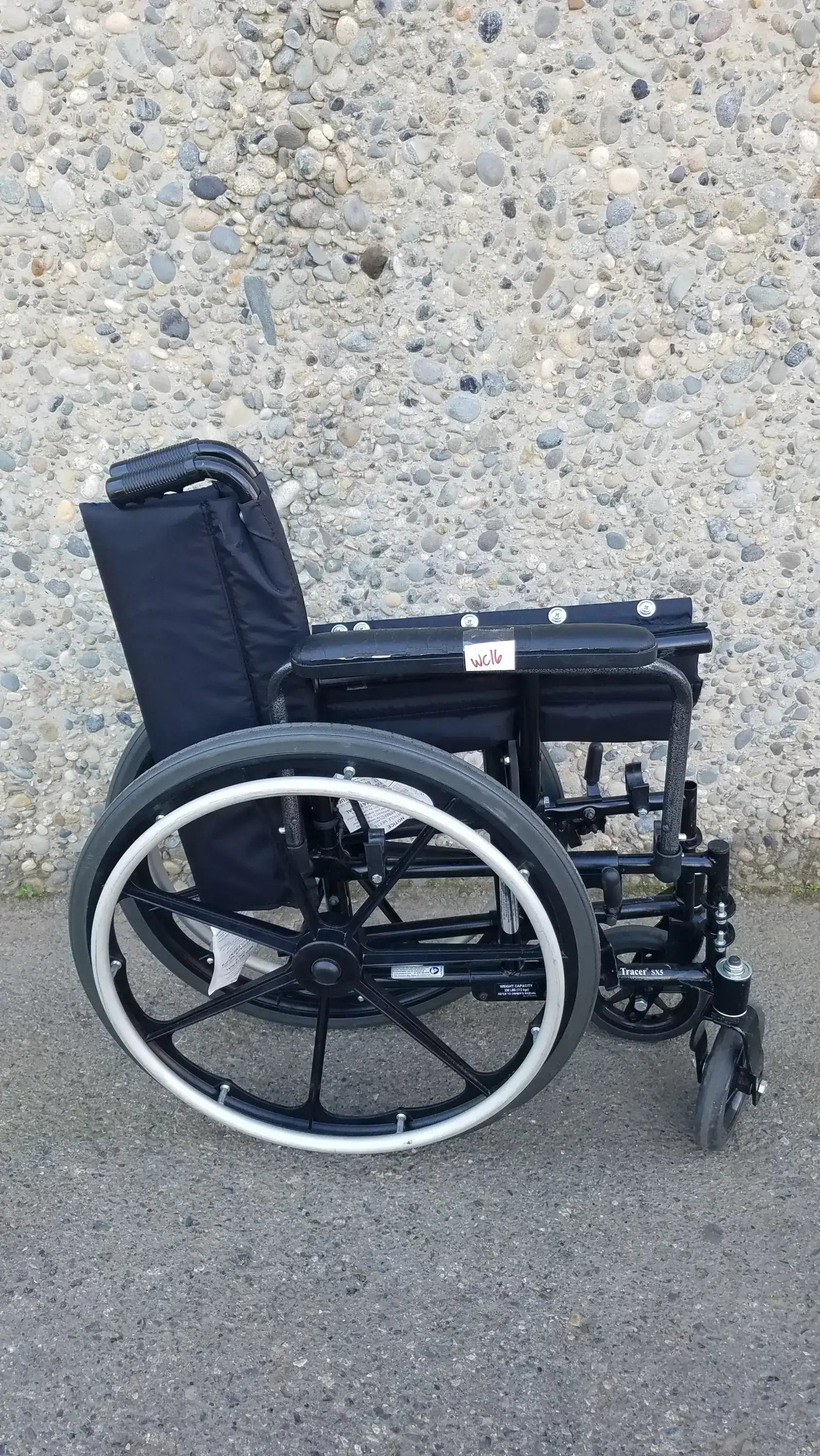Invacare Tracer SX5 Heavy-Duty Black Wheelchair with Fixed Arm Rests