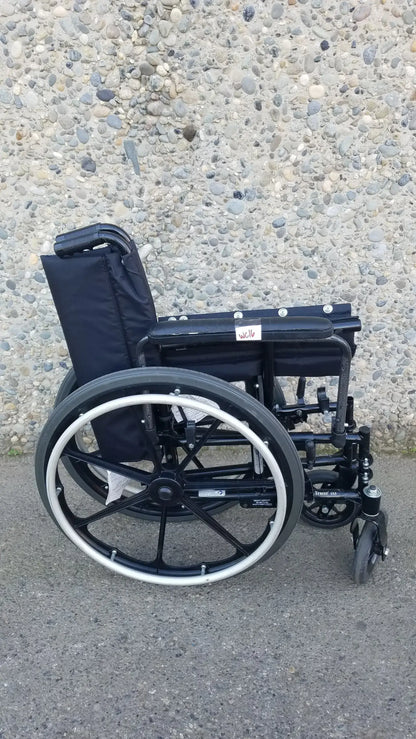 Invacare Tracer SX5 Heavy-Duty Black Wheelchair with Fixed Arm Rests