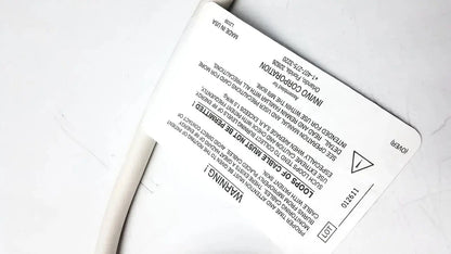 White rectangular label with black text and warning symbol on back of Invivo 9240A MRI ECG lead wires cable