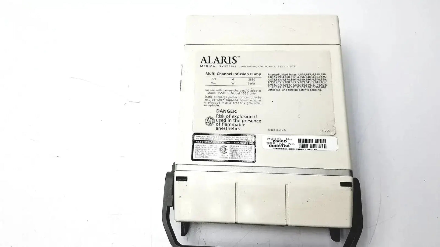 White alaris multi-channel infusion pump with black tubing and model 60u478b label connected to patient monitor 2860d medsystem iii