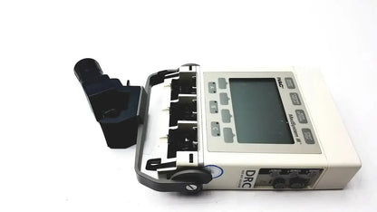 White and black alaris ivac medsystem iii patient monitor 2860d with digital display, buttons, and four infusion ports