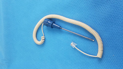 Blue ivac turbotemp oral temperature probe with coiled beige cable and metallic tip for reuse medical equipment use
