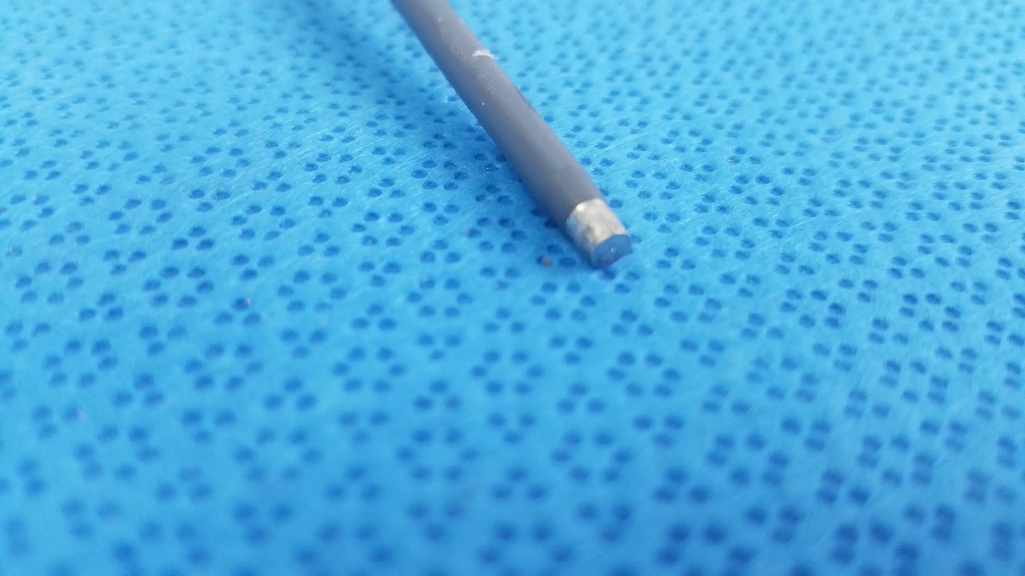 A dark gray cylindrical ivac turbotemp oral temperature probe with metallic silver tip for reuse medical equipment