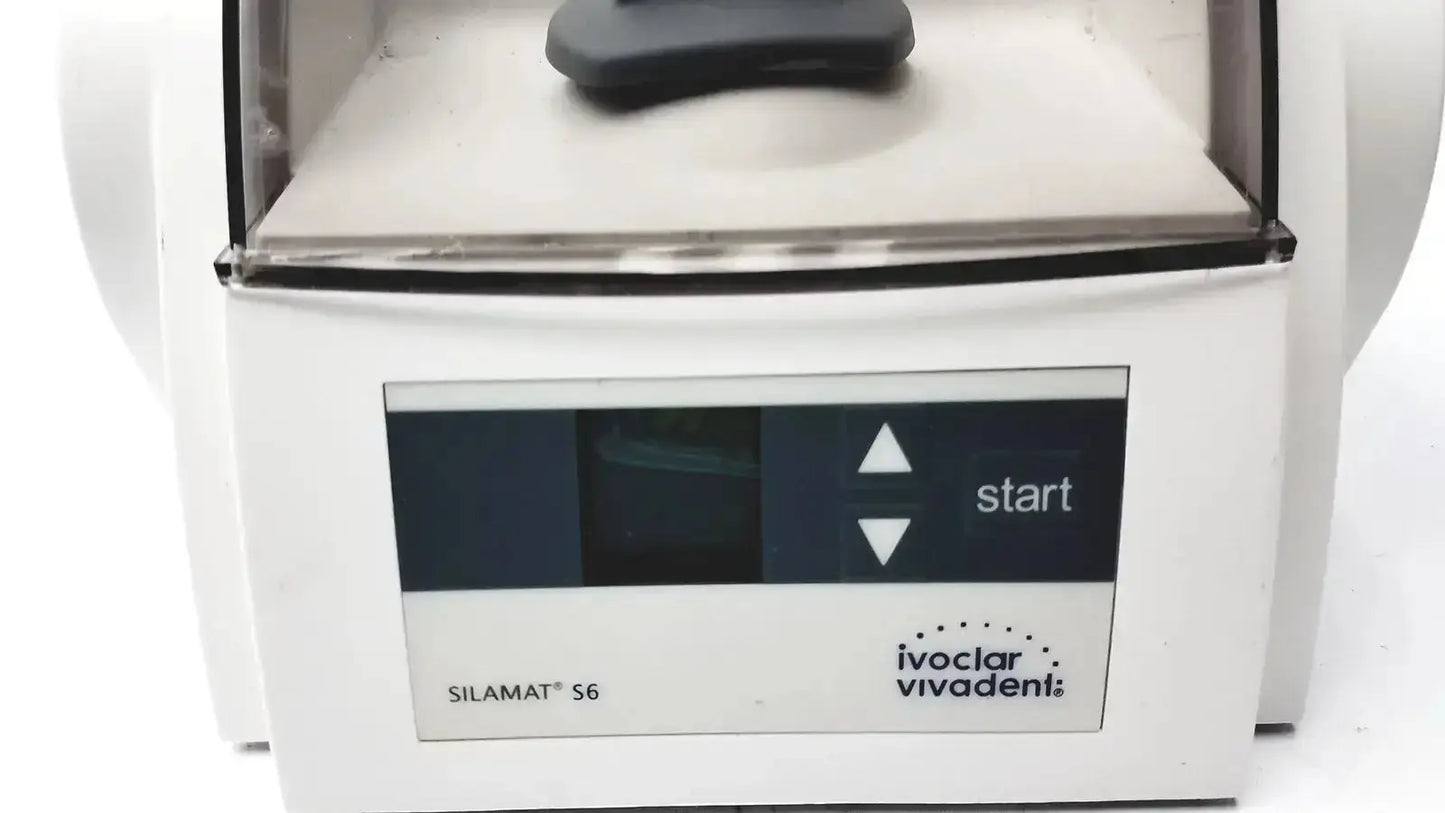 White plastic ivoclar vivadent silamat s6 amalgamator with black control panel and start button for dental mixing use